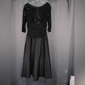 Jessica Howard Black Sequin Midi Dress With Flared Skirt in a size 8